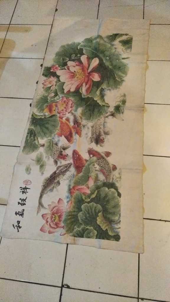 LUKISAN TANGAN DI ATAS KAIN