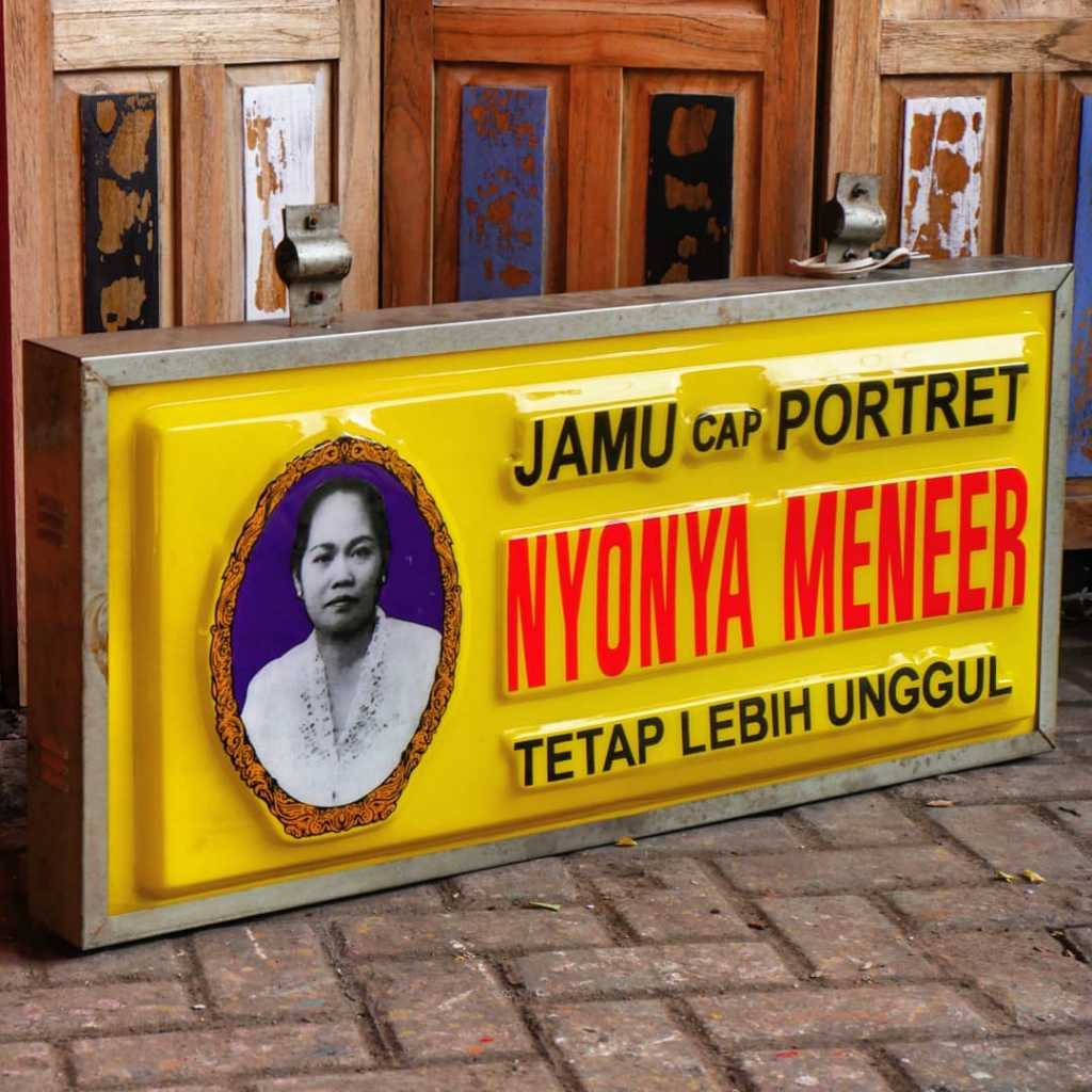 Neonbox Nyonya Meneer Jamu Cap Portret