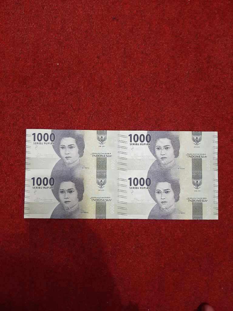 Uang 1000 rupiah cut mutia