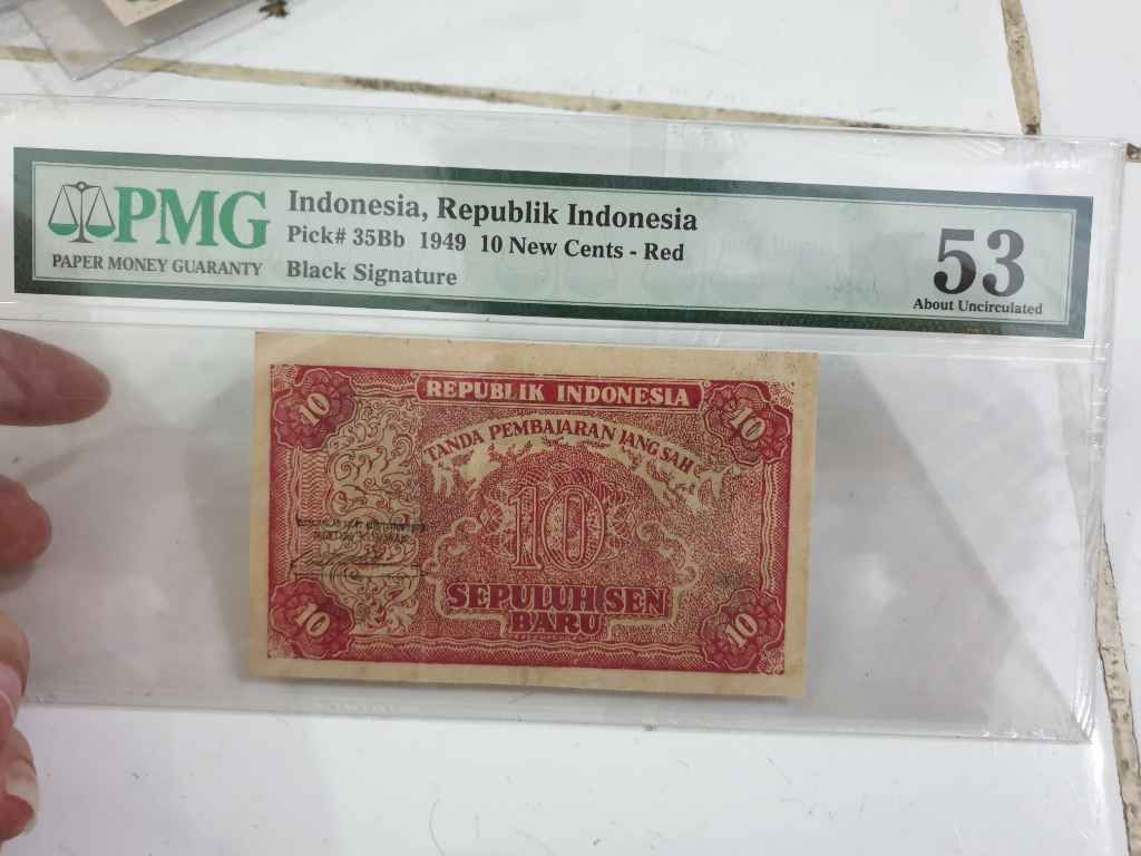 Uang oriba 10sen 1949 aunc pmg 58