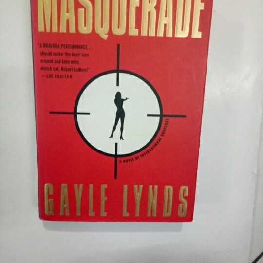 Masquerade ; an edge of the seat spy novel with gutsy character and page turn in suspense