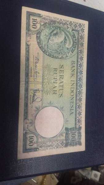 BL 2068 uang kuno 100 rupiah tupai tahun 1957 bekas pakai sesuai foto