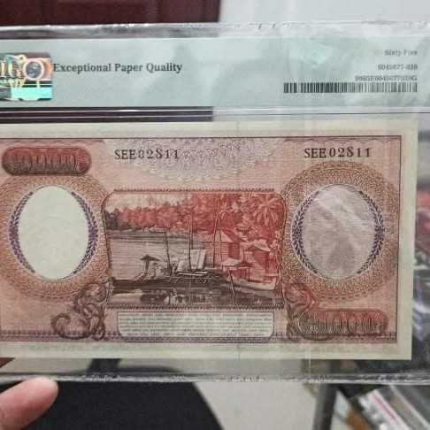 PMG pekerja merah 10000 pmg 65