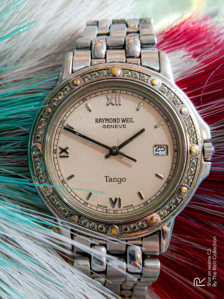 Raymond outlet weil harga