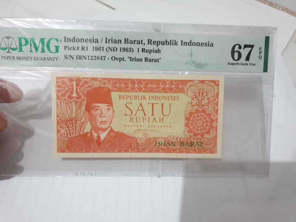 Soekarno rp1 irian barat 1961 top pop pmg 67 epq
