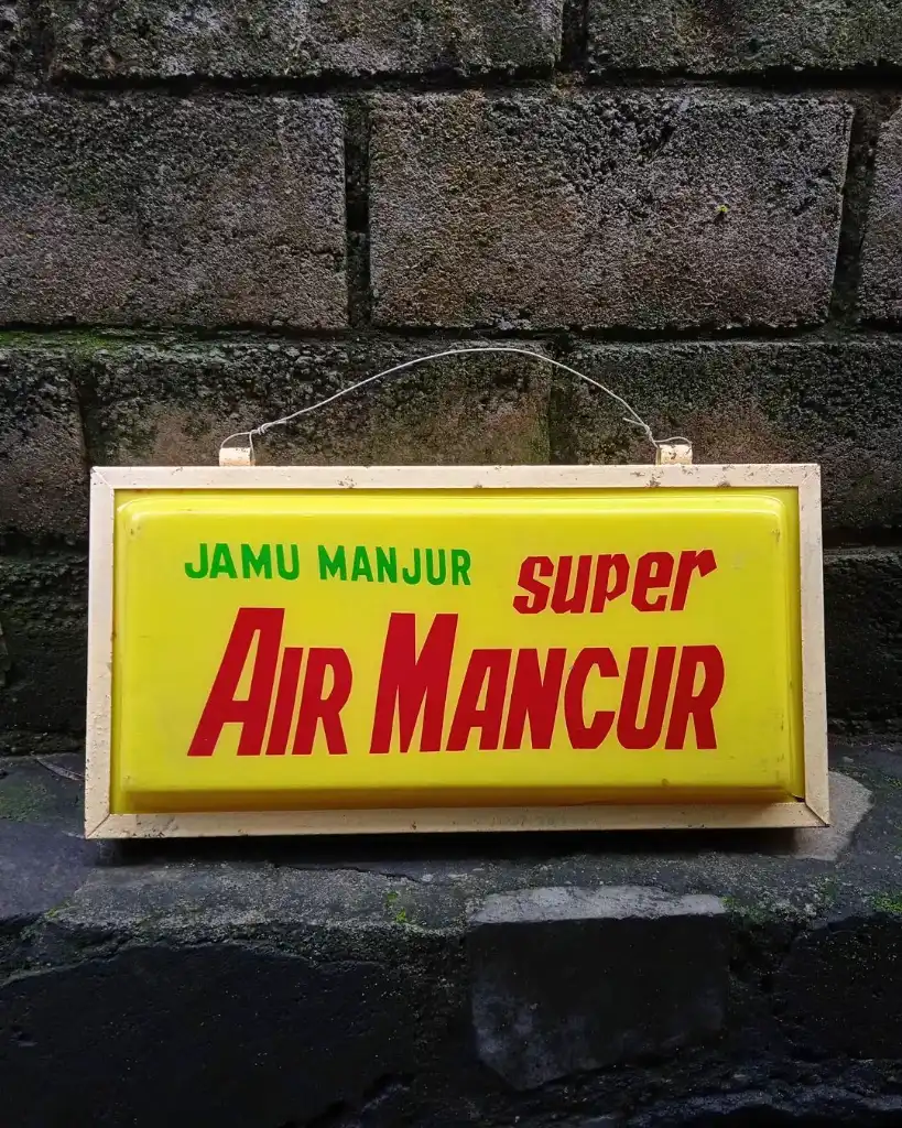 Reklame Neon Box "jamu AIR MANCUR" lawas.