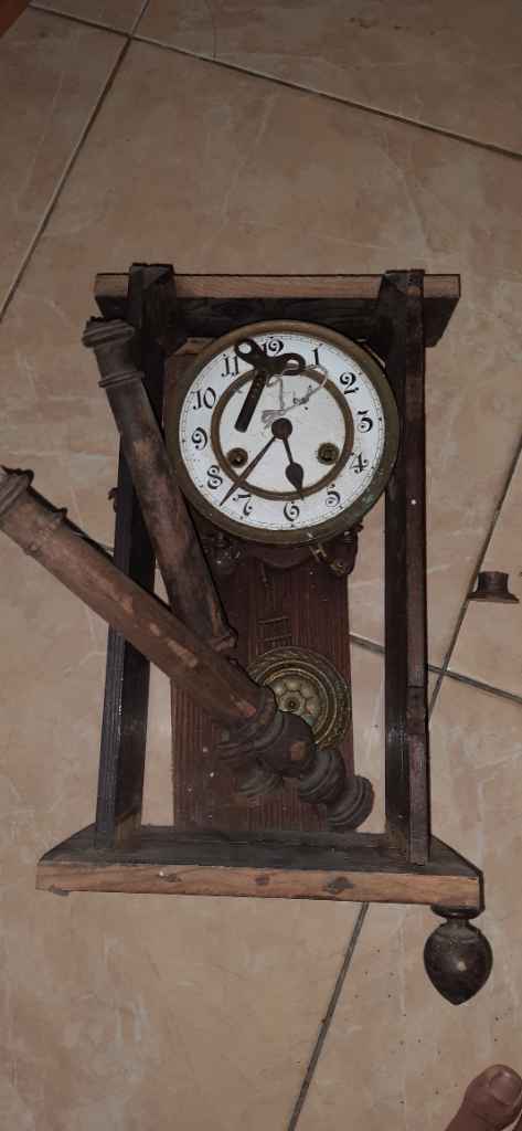 jam tembok jenis R.A bahan