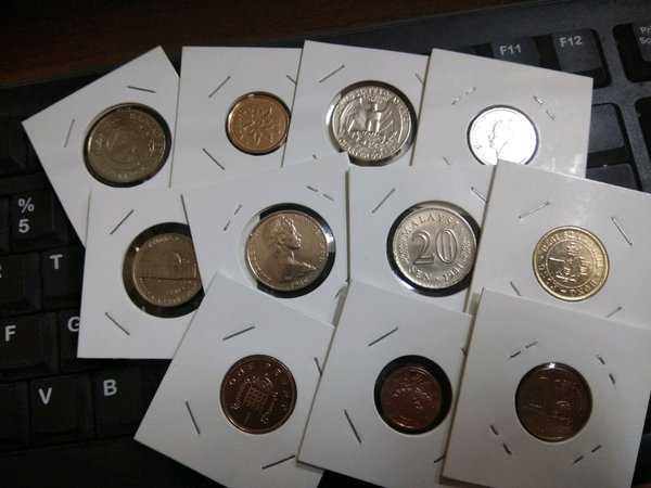 X741 Lot 11 Keping berbeda koin asing sesuau gambar