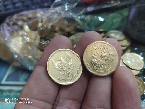 A2527 Per 1 keping Koin Kuno 100 Rupiah karapan Sapi Sudah DiBersihkan