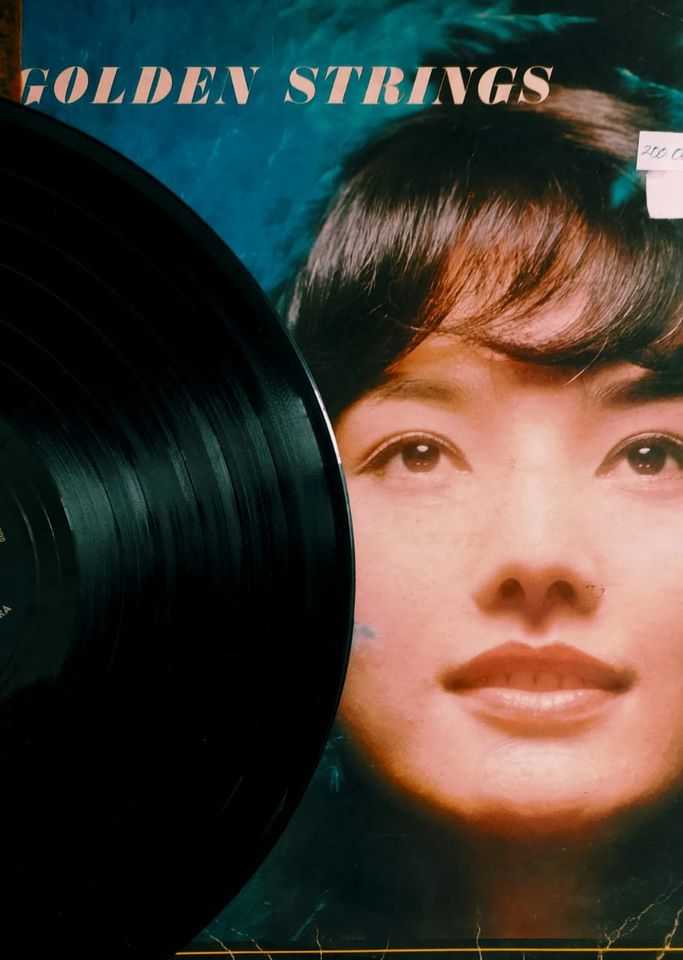 Piringan Hitam Golden Strings