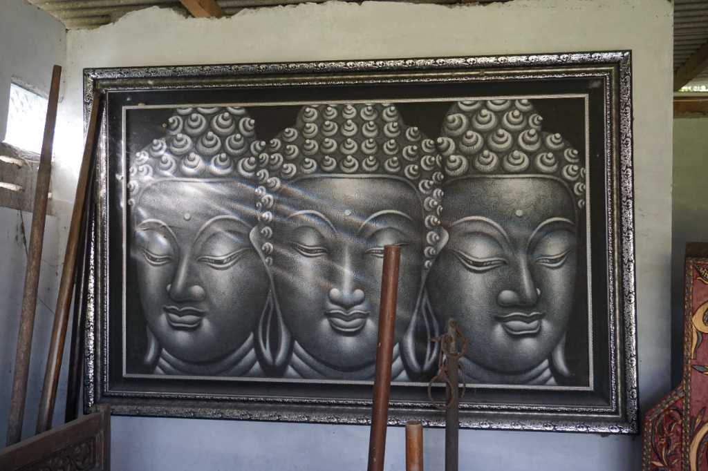 lukisan tiga kepala Budha