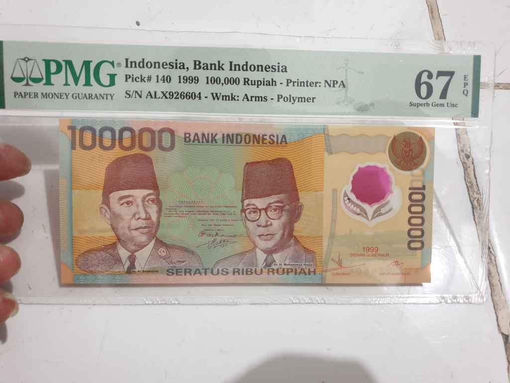 Uang rp 100.000 polimer 1999 pmg 67epq
